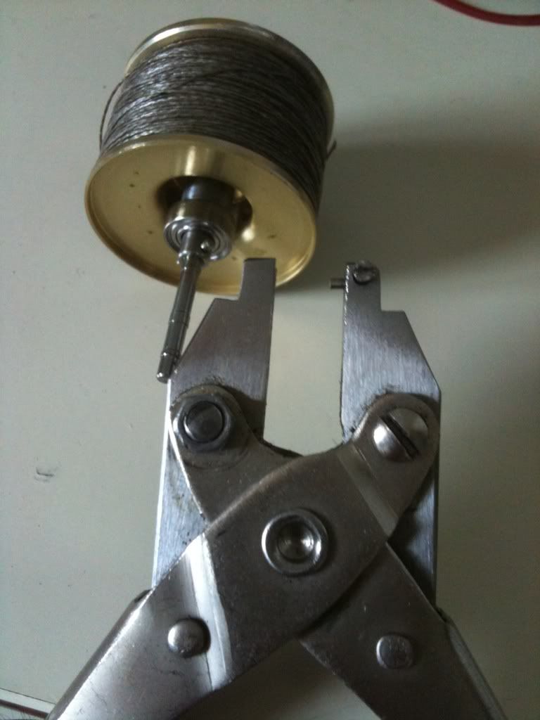 Tool for removing spool/shaft pin.
